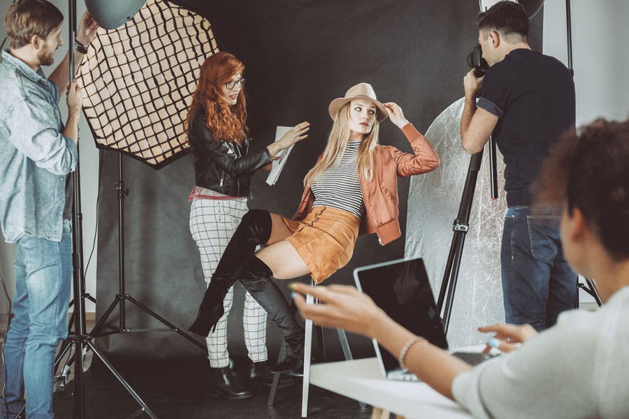 behind the scenes of a model photo shoot