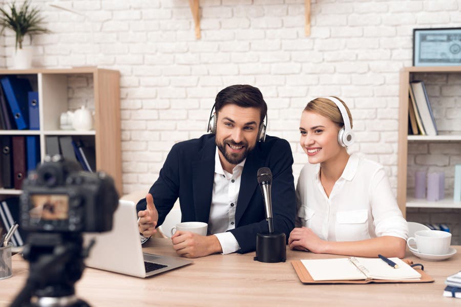 male and female live video podcasters