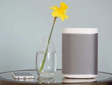 multi-room speaker on a side table