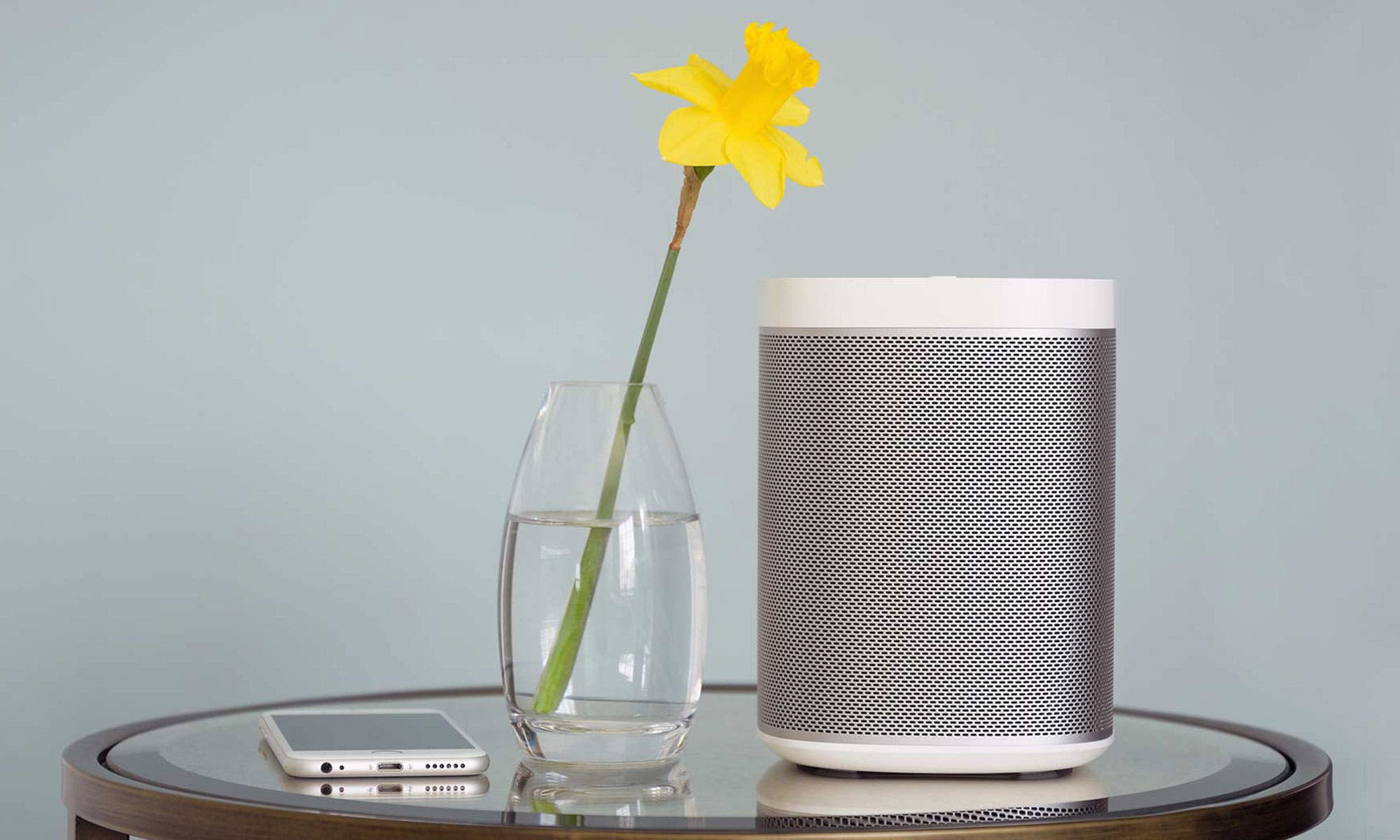 multi-room speaker on a side table