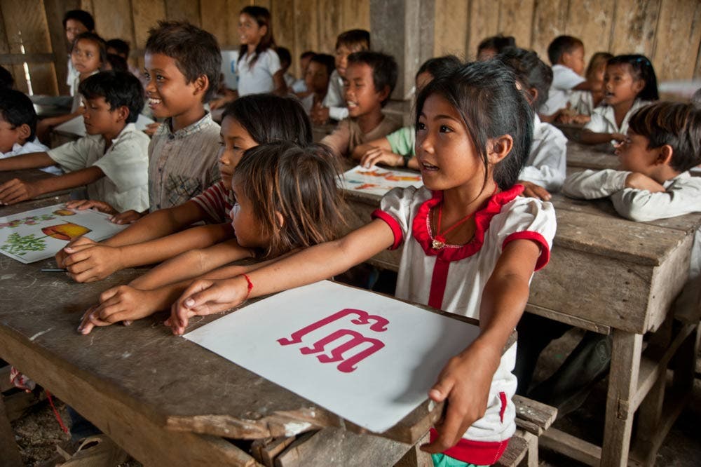 annie griffiths photography girl child student cambodia