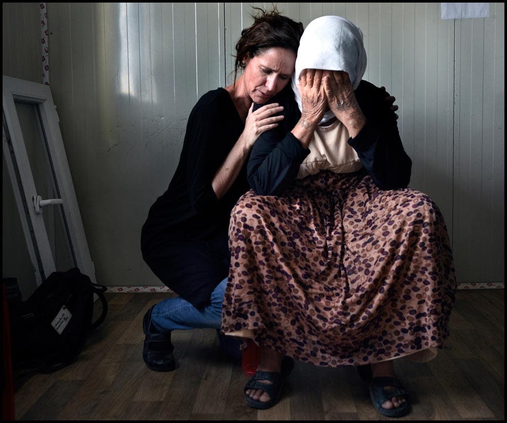 Carol Guzy/Zuma Press