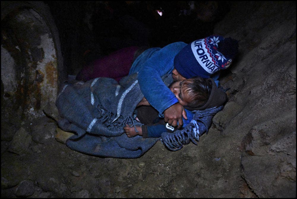 Carol Guzy/Zuma Press migrants