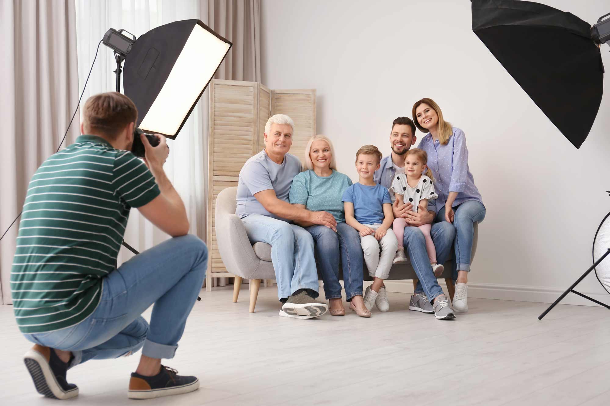 a photographer taking a family portrait