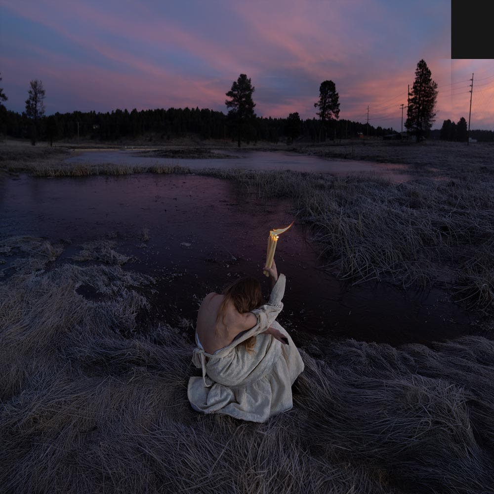 Brooke Shaden offering self portrait