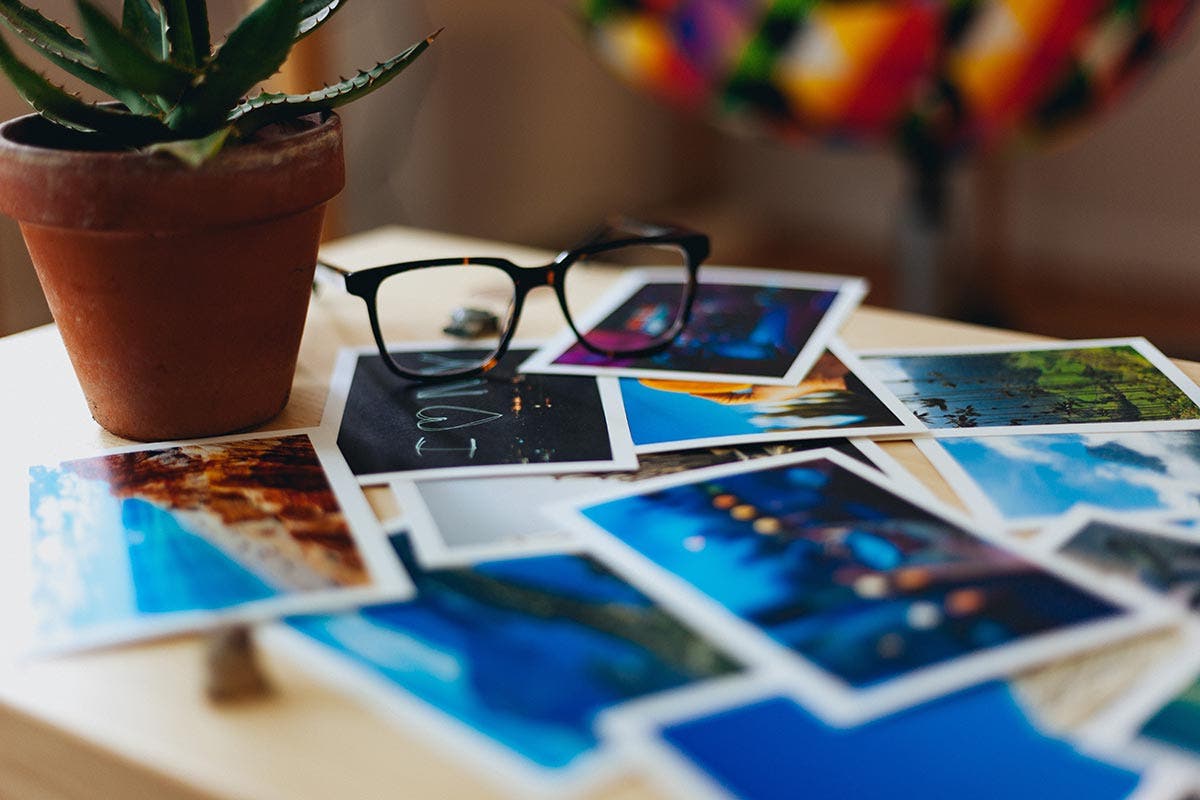 photo prints on table