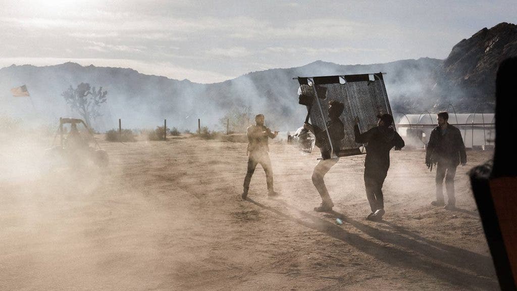 filmmaking cameras and crew on set in desert
