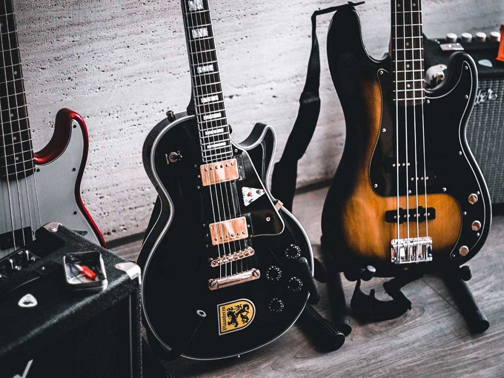 bass and guitar in recording studio for band