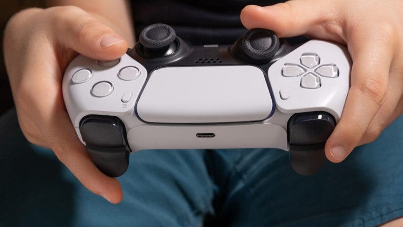 man playing ps5 sony playstation 5 controller best gaming consoles