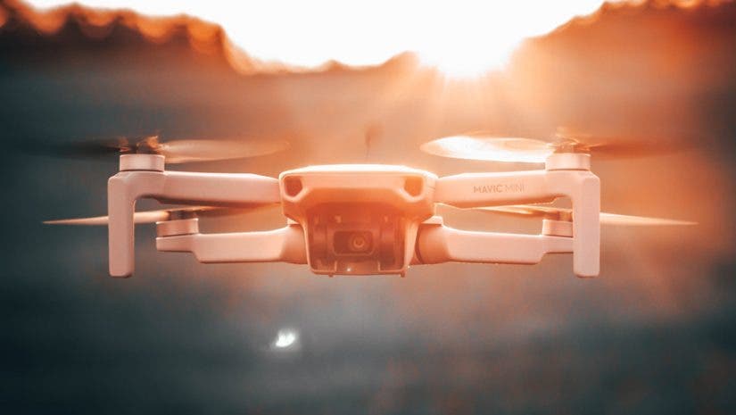 drone flying at sunset drones for beginners dji mavic mini drone