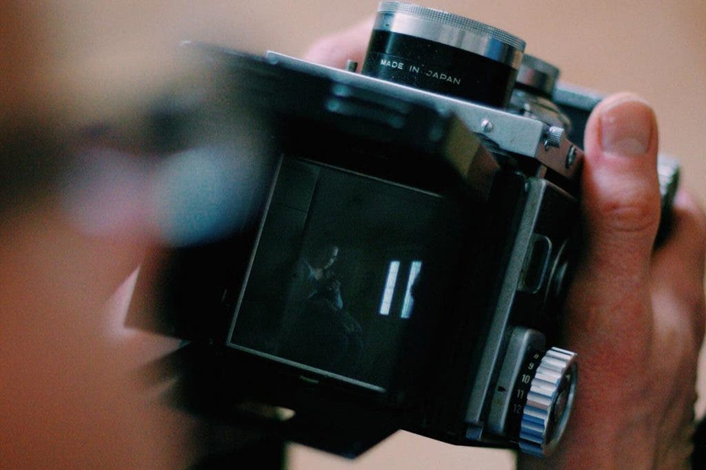 photographer with medium format camera