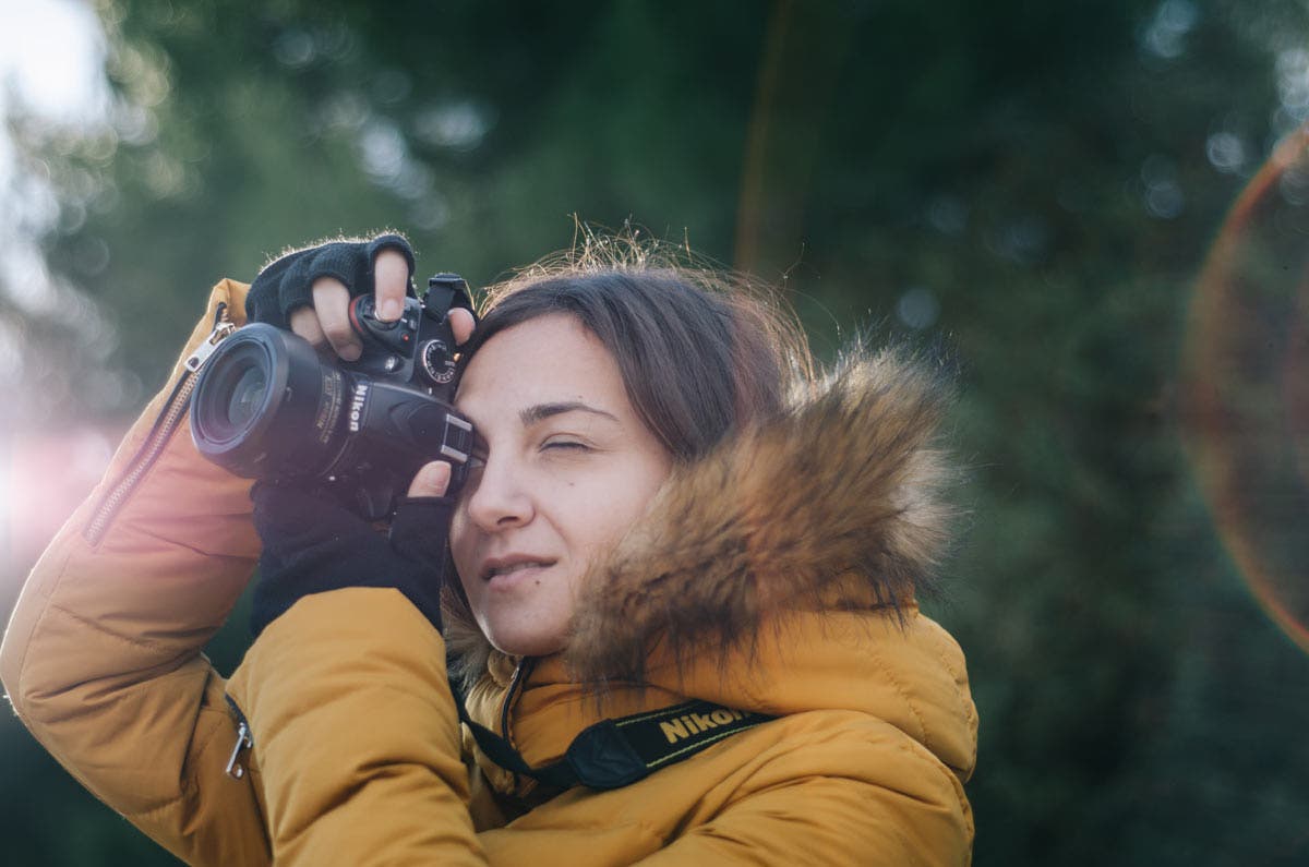 photographer shooting in winter cold weather photography