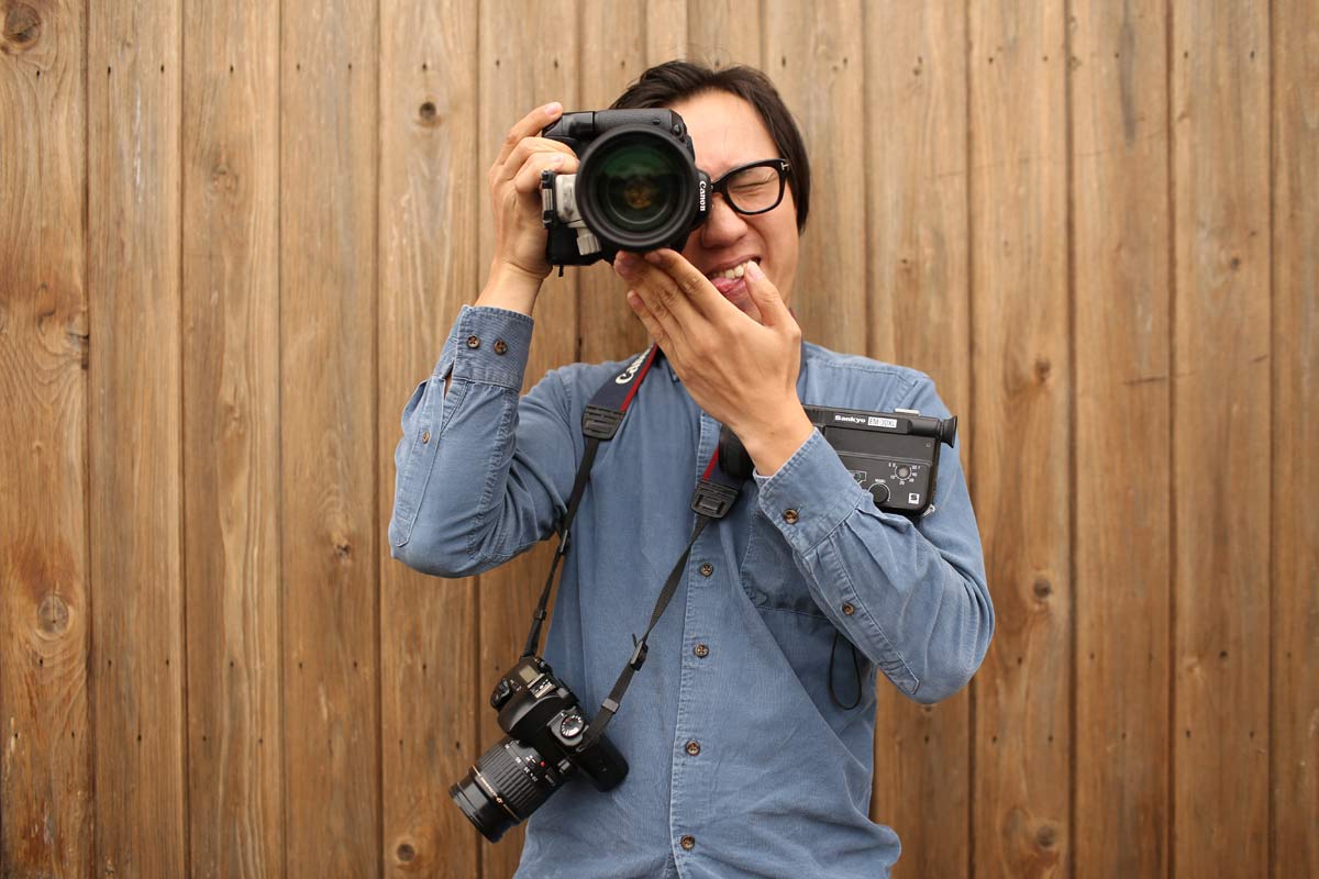 photographer with cameras