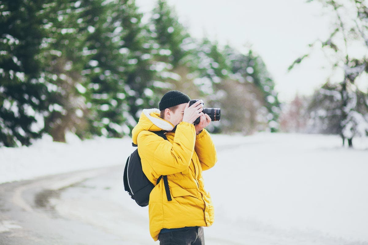 photographer shooting outside winter photography cold weather photography