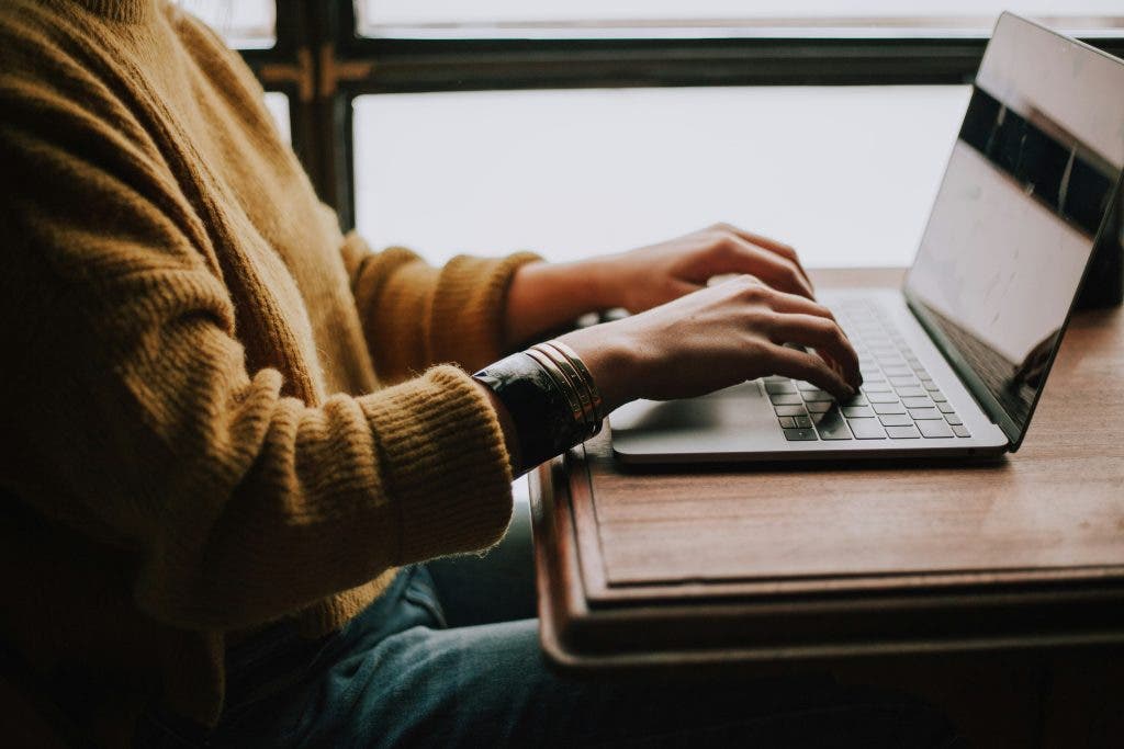 Woman searching "how to edit videos like a pro?"