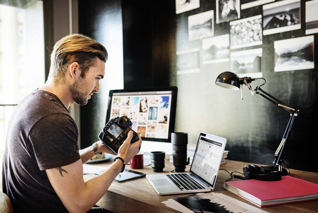 photographer with camera photography business