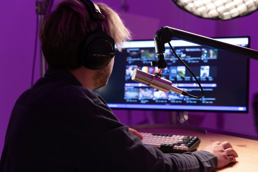 Man giving a lecture on how to edit videos in 2024