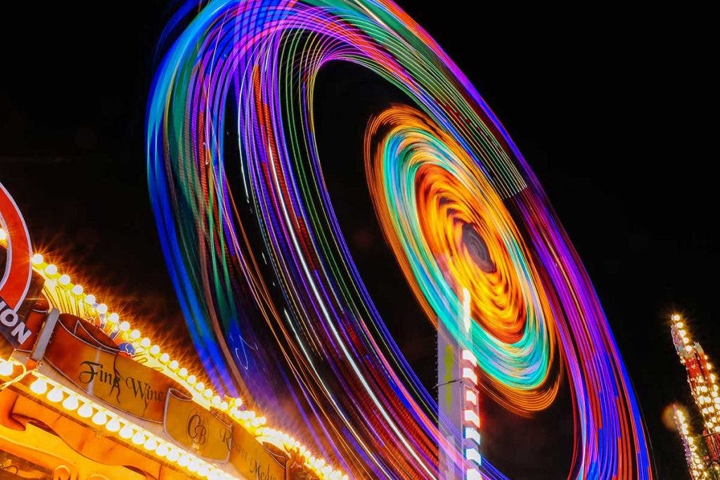 ferrish wheel motion blur neon lights