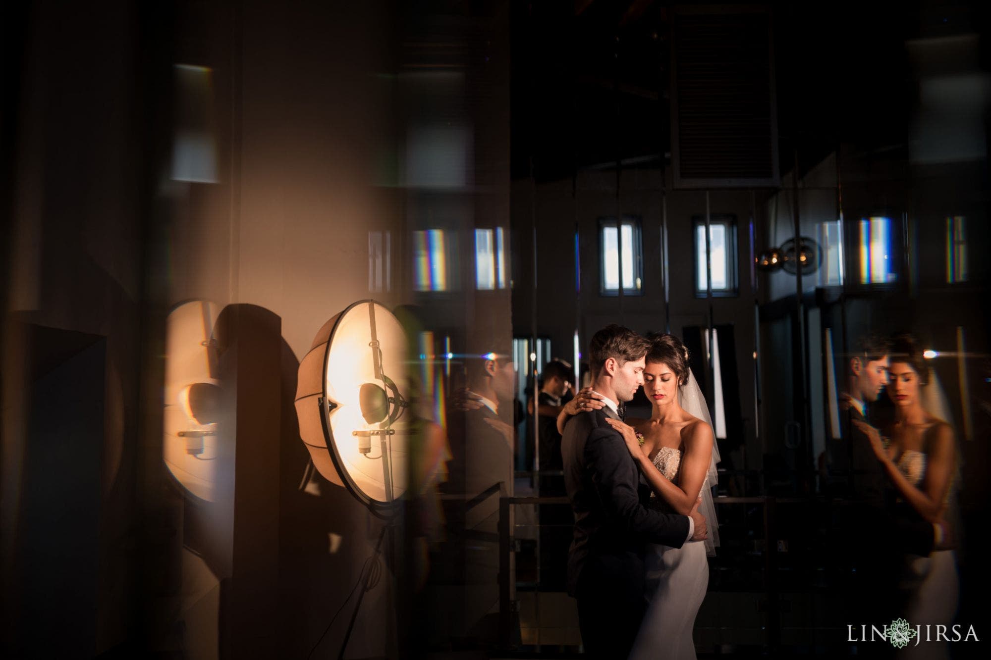 couple poses for dramatic image