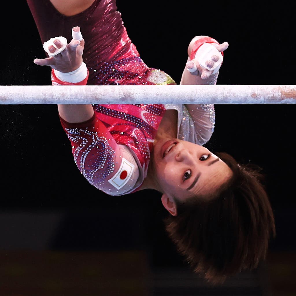 TOKYO, JAPAN - JULY 25: Mai Murakami of Team Japan competes on uneven bars during Women's Qualification on day two of the Tokyo 2020 Olympic Games at Ariake Gymnastics Centre on July 25, 2021 in Tokyo, Japan. (Photo by Jamie Squire/Getty Images)