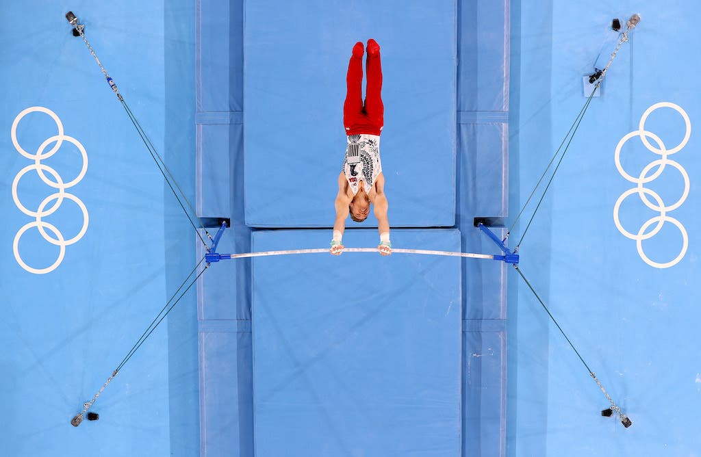 TOKYO, JAPAN - JULY 24: Shane Wiskus of Team United States competes on the horizontal bar during Men's Qualification on day one of the Tokyo 2020 Olympic Games at Ariake Gymnastics Centre on July 24, 2021 in Tokyo, Japan. (Photo by Jamie Squire/Getty Images)