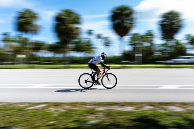 Pan Shot Photography of Cyclist - 42West, Adorama