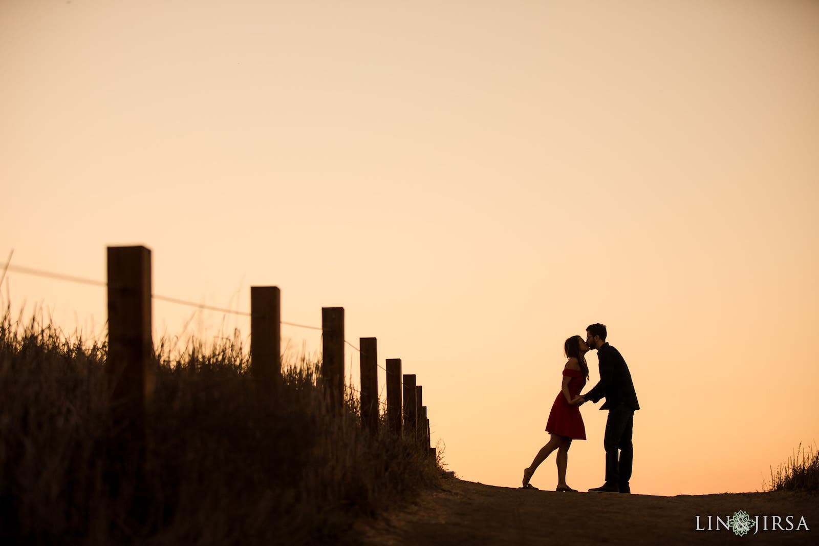Couple kisses on horizon