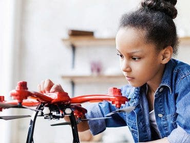 drones in education student flying drone
