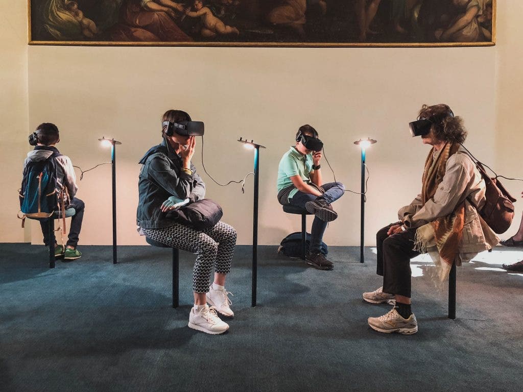 augmented reality vs virtual reality players with headsets
