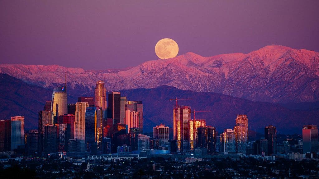 lens compression makes moon mountains and buildings look close together