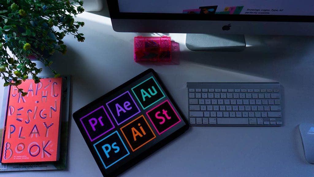 adobe programs logos on tablet and imac