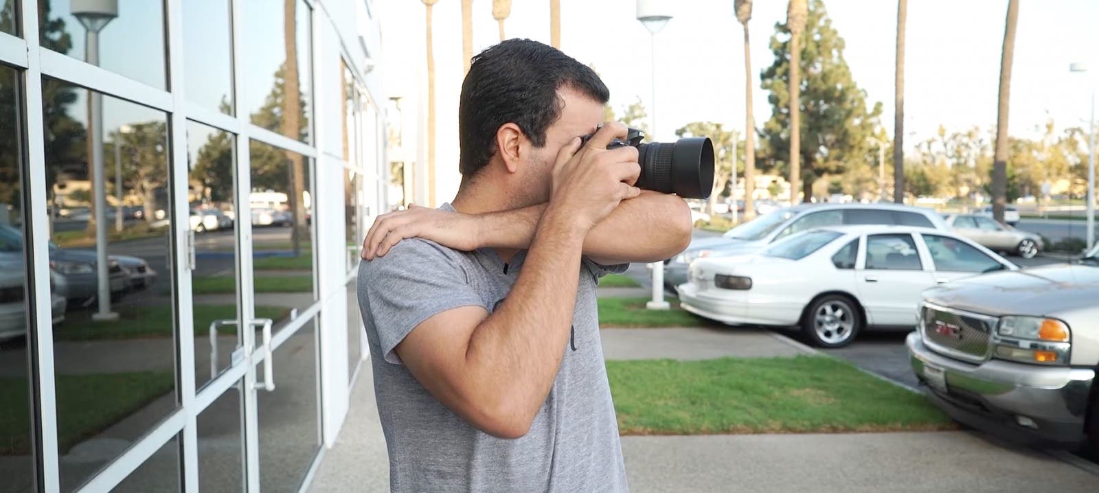 Photographer holding camera