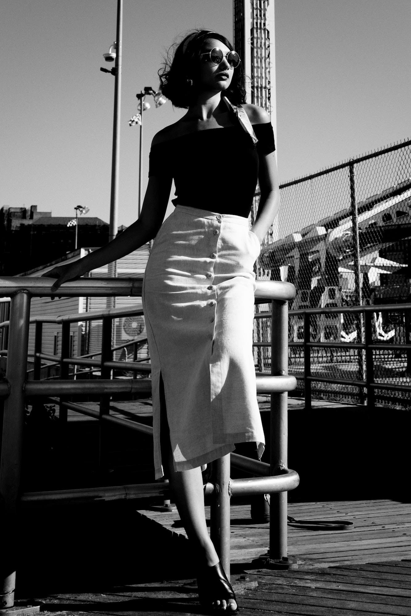Portrait model poses for shadow photography