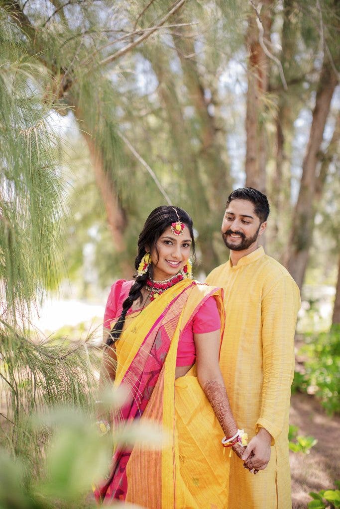 couple illustrates how to smile for pictures