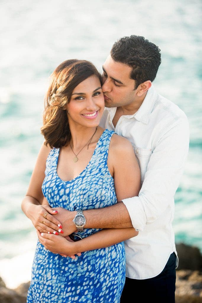 Couple poses at the beach