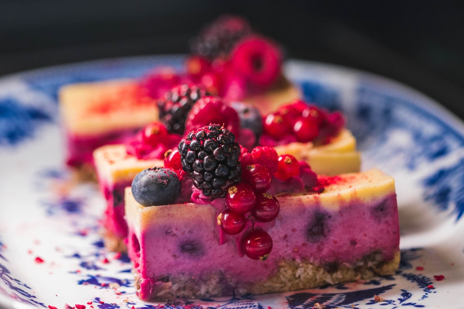 side shot of berries on cheesecake for dessert photography