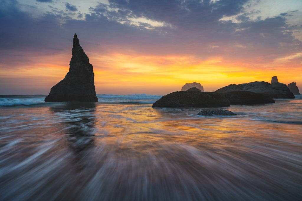 The image on the left has too much contrast. Even though the sunset pops, it appears over-edited.