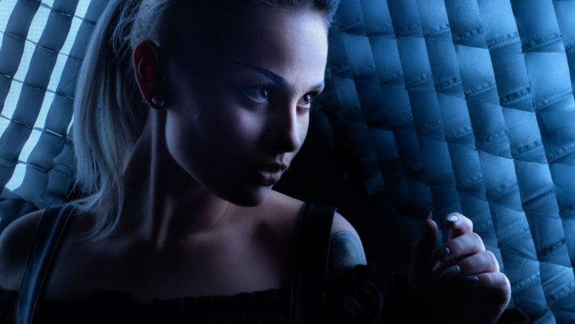 Female model between two gridded softboxes Best Portrait lens to use in studio here was 70mm