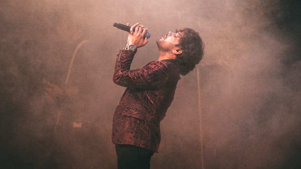 singer on stage with microphone
