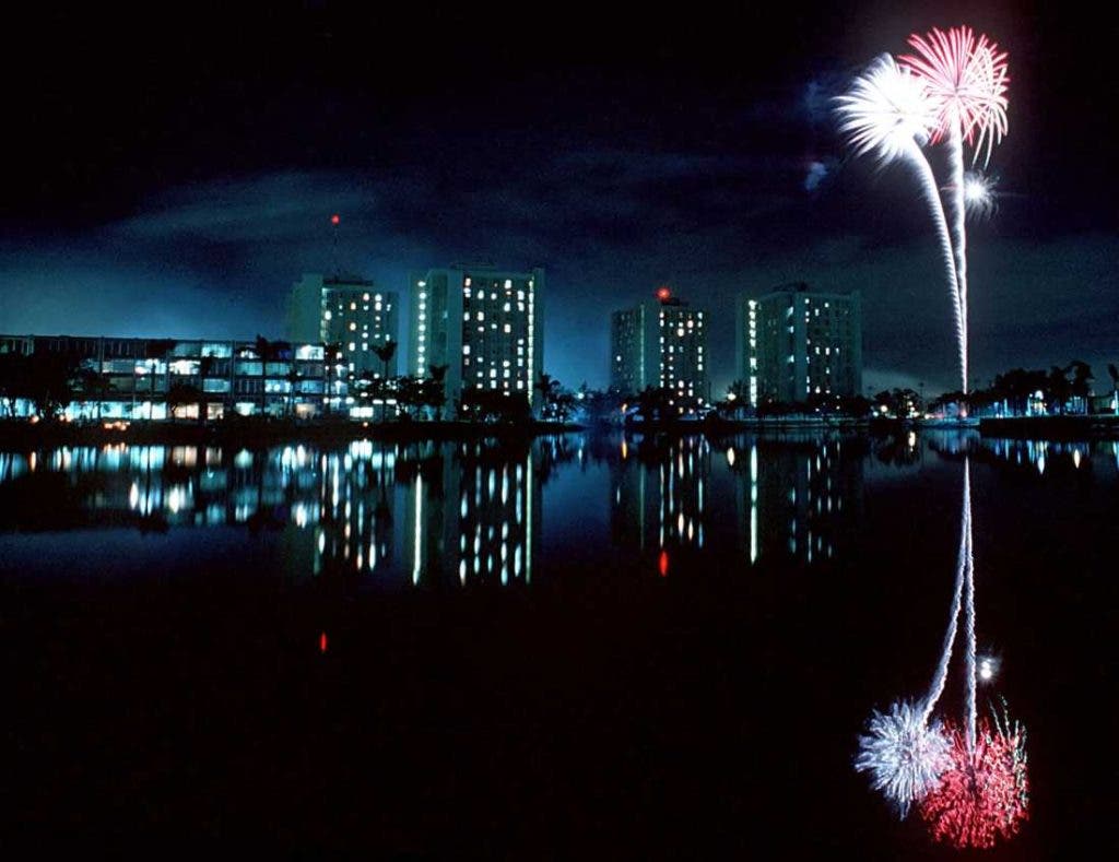 Fireworks are reflected in Lake Osceola at the University of Miami in Miami, Florida. Photo by David Bergman.