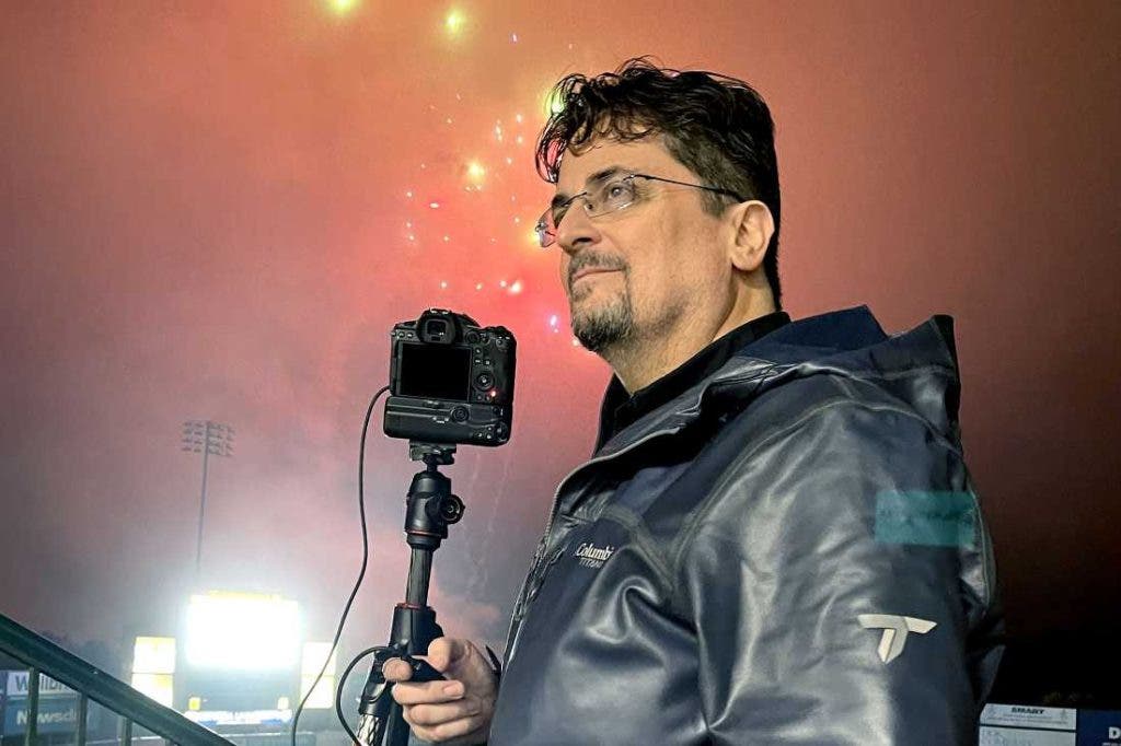 David Bergman uses a tripod and cable release to steady his camera while capturing fireworks photos.