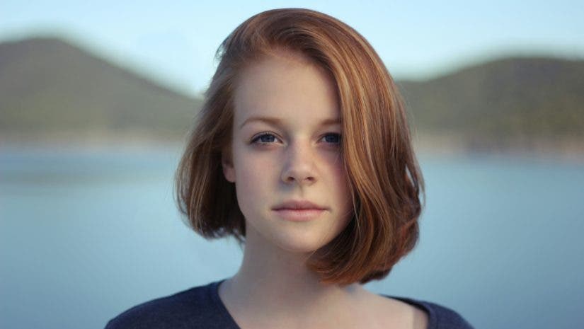 A portrait in front of a landscape shot in landscape orientation