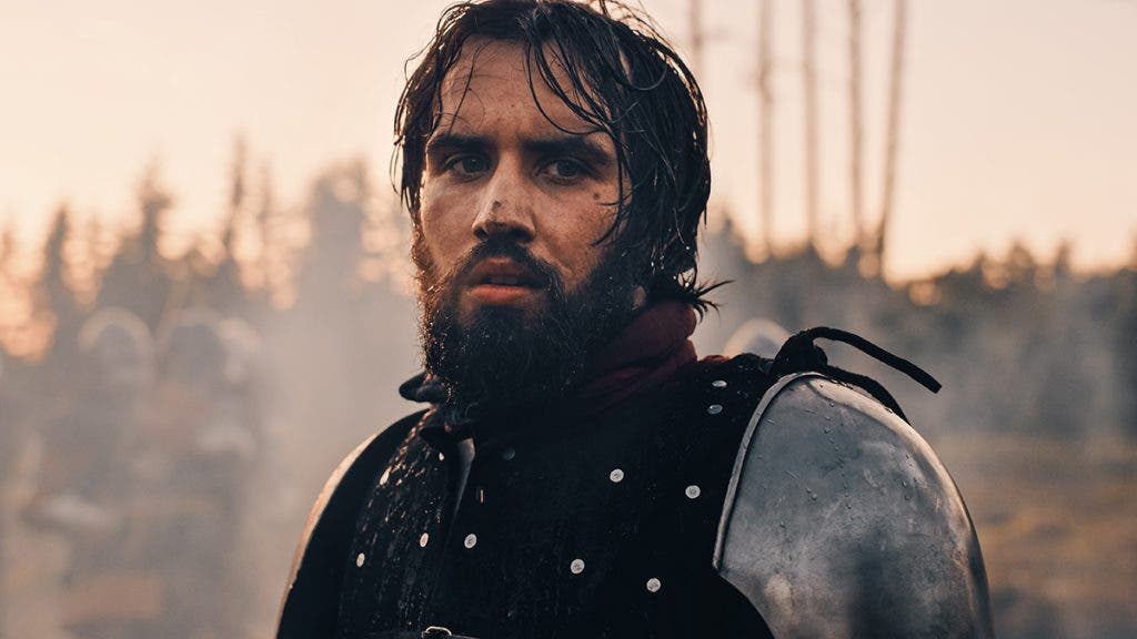 Handsome Medieval Knight King on Battlefield, Looking at Camera. Portrait of Mighty Warrior Soldier Contemplating Victory. War, Invasion, Conquest. Dramatic Scene in Cinematic Historic Reenactment