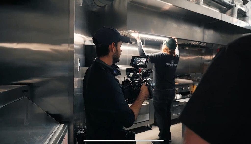 Behind the scenes of a food videography shoot in the kitchen
