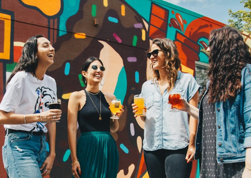 Girls having summer drinks with sunglasses on
