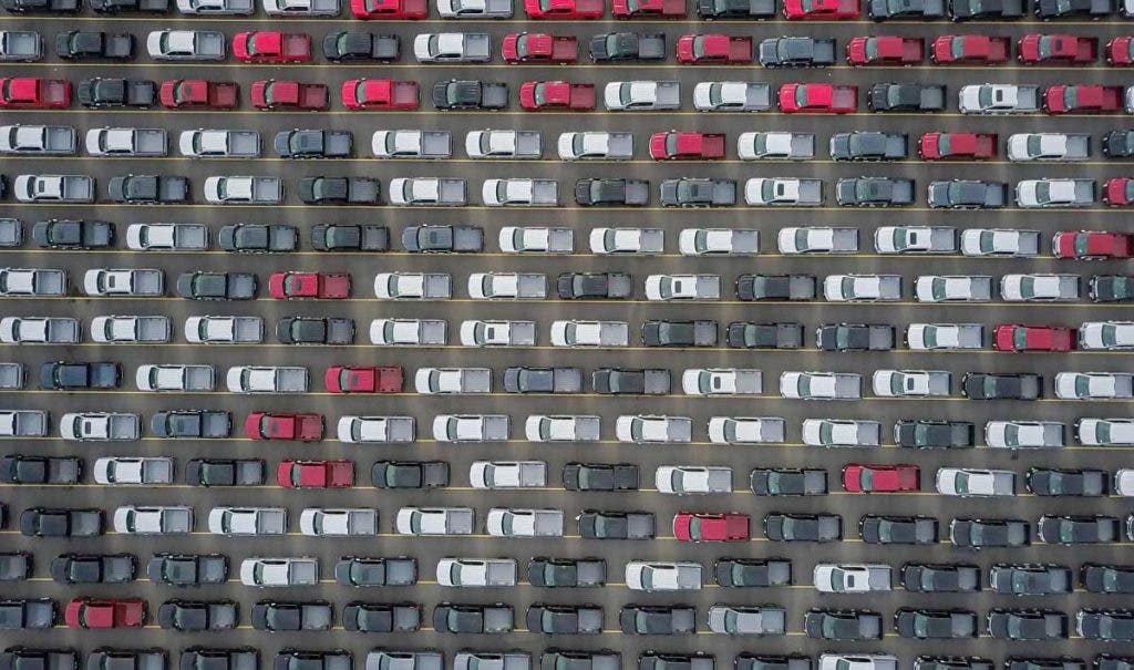 Drone telling the story of a row of trucks
