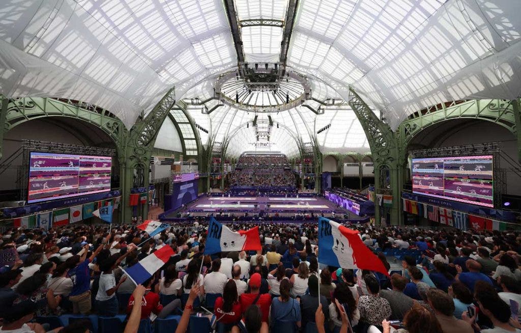 PARIS, FRANCE - JULY 28: France fans cheer as fencers compete on day two of the Olympic Games Paris 2024 at Grand Palais on July 28, 2024 in Paris, France. (Photo by Al Bello/Getty Images)