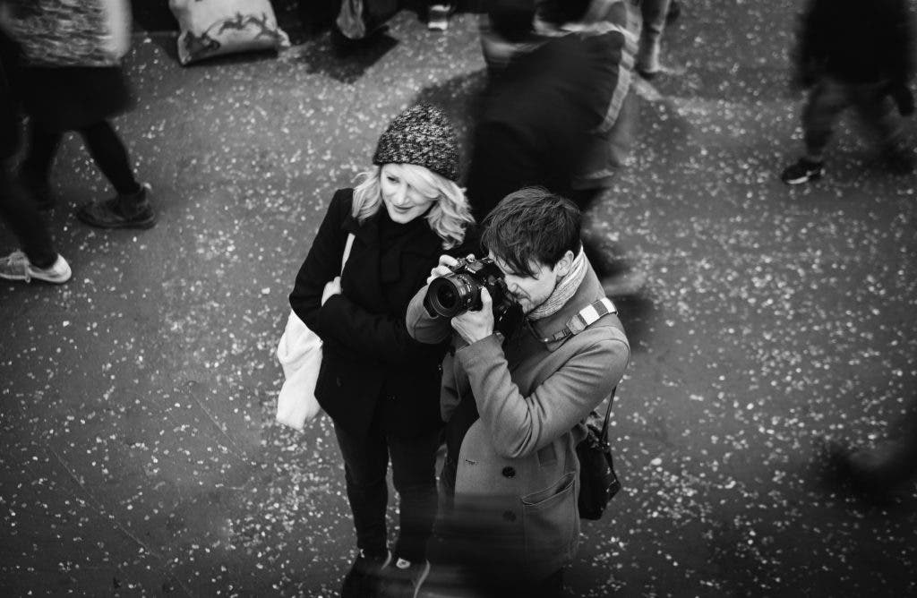 two photographers teaching each other a new technique