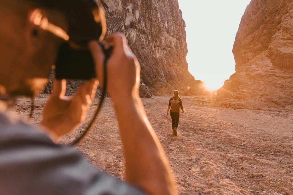 A photographer shooting during golden hour