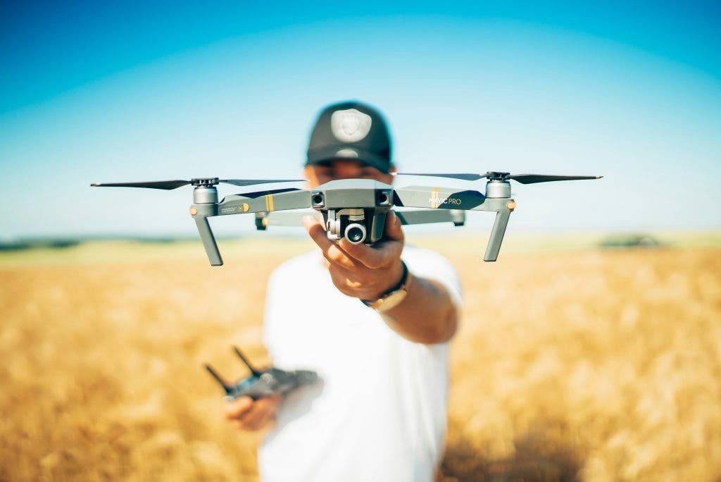 a man showcasing a drone